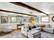 Cozy living room with wood floors, bright colors, and comfortable furnishings at 8019 E Hanna Ave, Indianapolis, IN 46239