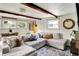Cozy living room with wood floors, bright colors, and comfortable furnishings at 8019 E Hanna Ave, Indianapolis, IN 46239