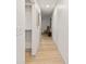 Bright hallway features beautiful floors and leads to rooms with an inviting aesthetic at 8246 Windcombe Blvd, Indianapolis, IN 46240