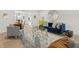 Living room with hardwood floors, stylish furniture, and open view to dining area at 8246 Windcombe Blvd, Indianapolis, IN 46240