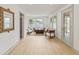 Bright living room with stylish decor, natural light, and hardwood floors at 8246 Windcombe Blvd, Indianapolis, IN 46240
