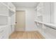 Spacious walk-in closet with ample shelving, providing storage and organization at 8246 Windcombe Blvd, Indianapolis, IN 46240