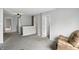 Upstairs hallway with neutral color scheme, and two doors leading to bedrooms or bathrooms at 8301 Wheatfield Dr, Camby, IN 46113