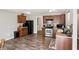 Cozy kitchen with stainless steel appliances and wooden floor at 8301 Wheatfield Dr, Camby, IN 46113