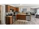 Kitchen with stainless steel appliances and tile backsplash at 8301 Wheatfield Dr, Camby, IN 46113