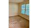 Bedroom with natural light from two windows at 8326 Alcona Dr, Indianapolis, IN 46237