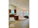 Open-concept kitchen with modern appliances, a spacious island, and plenty of natural light at 8326 Alcona Dr, Indianapolis, IN 46237
