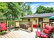 Multi-level deck featuring outdoor seating and dining areas, complete with a barbecue grill, for delightful outdoor living at 9042 Panorama Ct, Indianapolis, IN 46234