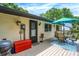 Inviting deck with a dining set, storage, and barbecue grill, perfect for outdoor entertainment and summer gatherings at 9042 Panorama Ct, Indianapolis, IN 46234
