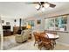 Open floor plan showcasing the living room, dining area, and a retro fireplace at 9042 Panorama Ct, Indianapolis, IN 46234