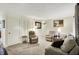 Spacious living room with neutral tones, comfortable seating and ample lighting at 9042 Panorama Ct, Indianapolis, IN 46234