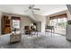 Bright bonus room with neutral colors and a ceiling fan at 10480 Stonegate Dr, Fishers, IN 46040