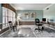 Cozy home office with carpet and a large window for natural light at 10480 Stonegate Dr, Fishers, IN 46040