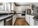 Updated kitchen with stainless steel appliances, a large sink, and bright lighting at 10480 Stonegate Dr, Fishers, IN 46040