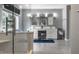 Luxurious main bathroom with double vanity, white cabinets and tiled floors at 10480 Stonegate Dr, Fishers, IN 46040