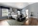 Inviting main bedroom suite with elegant chandelier and ensuite bath at 10480 Stonegate Dr, Fishers, IN 46040