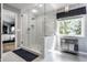 Elegant bathroom with a glass-enclosed shower and tile surround at 10480 Stonegate Dr, Fishers, IN 46040