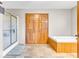 Bathroom featuring a separate shower, soaking tub, and tile flooring at 10705 N State Road 267, Brownsburg, IN 46112
