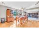 Large dining room features hardwood floors and access to a full bookshelf at 10705 N State Road 267, Brownsburg, IN 46112