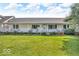 Charming single-story home with a welcoming front porch, lush lawn, and curb appeal at 10705 N State Road 267, Brownsburg, IN 46112