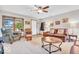 Cozy living room with comfortable seating, vintage decor, and great natural light at 10705 N State Road 267, Brownsburg, IN 46112