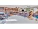 Spacious living room featuring built-in bookshelves and comfortable seating arrangements at 10705 N State Road 267, Brownsburg, IN 46112