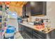 Functional storage area with custom black cabinets and countertop, perfect for organization at 10705 N State Road 267, Brownsburg, IN 46112