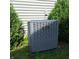A/C unit surrounded by bushes and ground cover at 10775 Cyrus Dr, Indianapolis, IN 46231