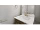 Bathroom featuring a modern sink, vanity, and brushed nickel hardware at 10778 Haverstick Rd, Carmel, IN 46033