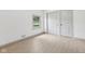 Empty bedroom with a window and closet at 10778 Haverstick Rd, Carmel, IN 46033
