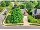 Charming home with manicured lawn, mature trees, and attached two-car garage in a desirable neighborhood at 1099 Saratoga Cir, Carmel, IN 46280