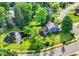 Beautiful home with mature trees, a manicured lawn, and serene pond views within a lovely neighborhood at 1099 Saratoga Cir, Carmel, IN 46280
