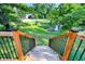 Backyard with a scenic view of a pond surrounded by lush landscaping, a natural retreat at 1099 Saratoga Cir, Carmel, IN 46280