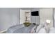 Comfortable bedroom with cozy decor and TV, perfect for relaxing and unwinding after a long day at 1099 Saratoga Cir, Carmel, IN 46280