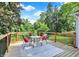 Inviting outdoor deck with comfortable seating, ideal for relaxing and enjoying the outdoors at 1099 Saratoga Cir, Carmel, IN 46280