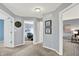 Upstairs hallway with carpet and neutral paint, offering easy access to the home's bedrooms at 1099 Saratoga Cir, Carmel, IN 46280