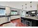 Bright, spacious kitchen features granite counters, stainless appliances and an island with seating at 1099 Saratoga Cir, Carmel, IN 46280