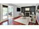 Open-concept living room with fireplace and backyard views at 1099 Saratoga Cir, Carmel, IN 46280