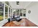 Bright sunroom filled with light, perfect for relaxing and enjoying views of the yard at 1099 Saratoga Cir, Carmel, IN 46280