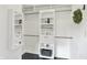 Organized walk-in closet with built-in shelving and modern design at 1099 Saratoga Cir, Carmel, IN 46280