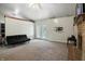 Inviting living room with a brick fireplace, vaulted ceilings and flooded with natural light at 1106 Summer Way Ct, Shelbyville, IN 46176