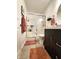 Bathroom featuring modern vanity, frosted glass shower, and neutral color palette at 1223 Long Shore Dr, Indianapolis, IN 46217