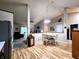 Comfortable dining area with modern lighting, wood-look floors, and easy access to living areas at 1223 Long Shore Dr, Indianapolis, IN 46217