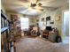 Home office with ample shelving, comfortable seating, and workspace for productivity at 1223 Long Shore Dr, Indianapolis, IN 46217