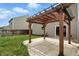 Backyard featuring a pergola, concrete patio, lawn, and the back of the house at 1236 N Aberdeen Dr, Franklin, IN 46131