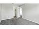 Bedroom with two doors, grey carpet, and neutral walls at 1236 N Aberdeen Dr, Franklin, IN 46131