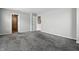 Spacious bedroom with grey carpet and white walls. There are also two closets for storage in the room at 1236 N Aberdeen Dr, Franklin, IN 46131