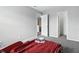 Bedroom with a race car bed, grey carpet, neutral walls, and two doorways at 1236 N Aberdeen Dr, Franklin, IN 46131