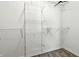 Walk-in closet with white walls, vinyl flooring, and chrome racks for clothing and storage at 1236 N Aberdeen Dr, Franklin, IN 46131