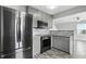 Modern kitchen with stainless steel appliances and ample gray cabinet space at 1236 N Aberdeen Dr, Franklin, IN 46131